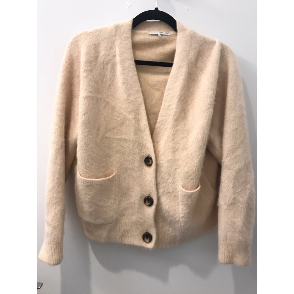 Sweater coat with pockets